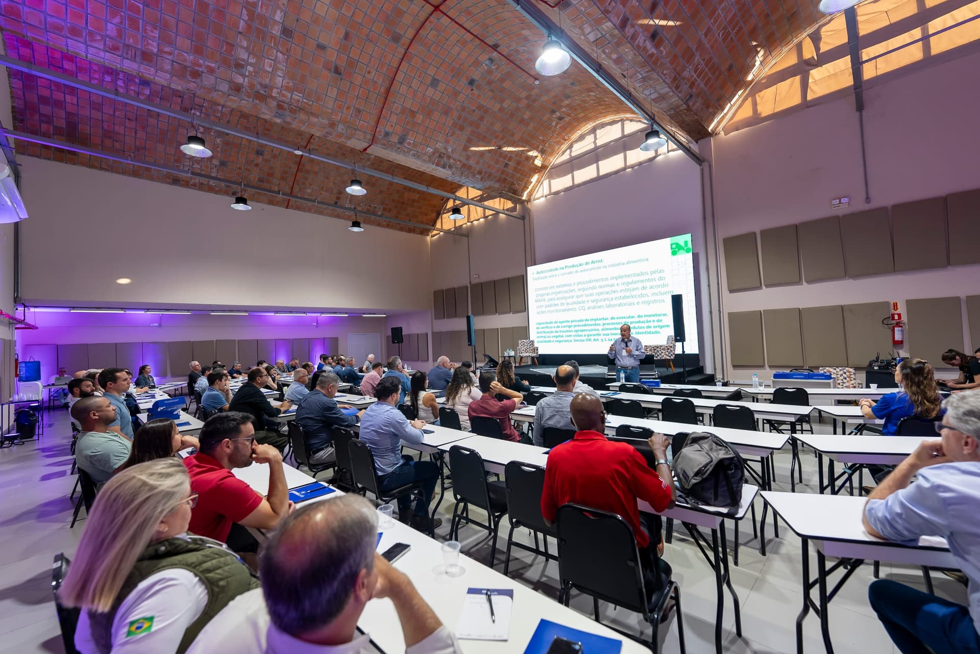 Attendees following a technical talk at a Grano Education event.